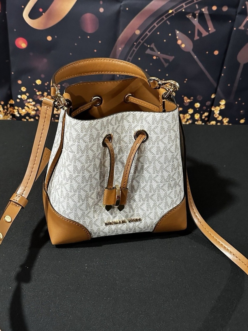 Michael Kors White & Tan Monogram Mini Drawstring Bucket Bag